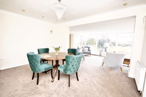 Dining room open to sun room- click for photo gallery